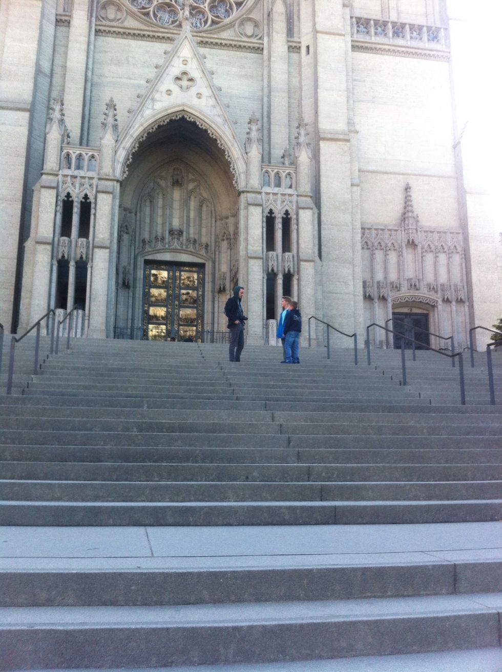 Look at the church and the men filming a music video in front of it