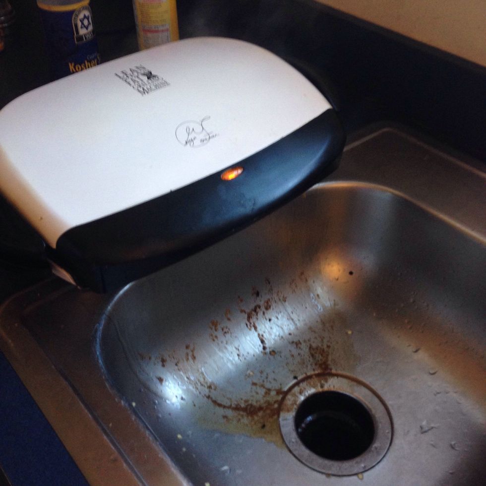 Look how much grease two burgers can create. Yuck!