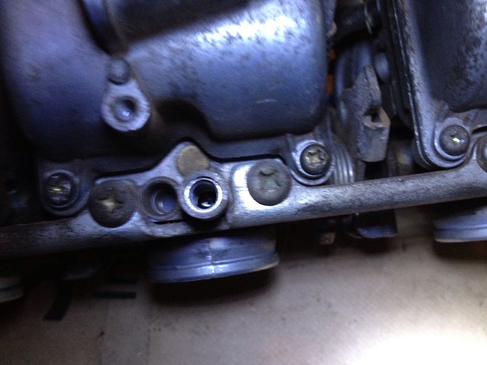 Look inside to make sure it's clear of everything. Swipe your magnet over it to remove any metal shavings. Turn it upside down and blow it out. Carb cleaner would be good now.
