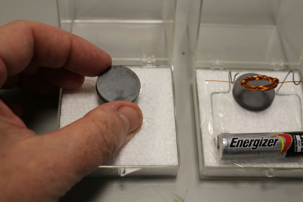 Looking at the example ( or these photos) position the magnet near one side of the block of foam, but in the center from the two sides.