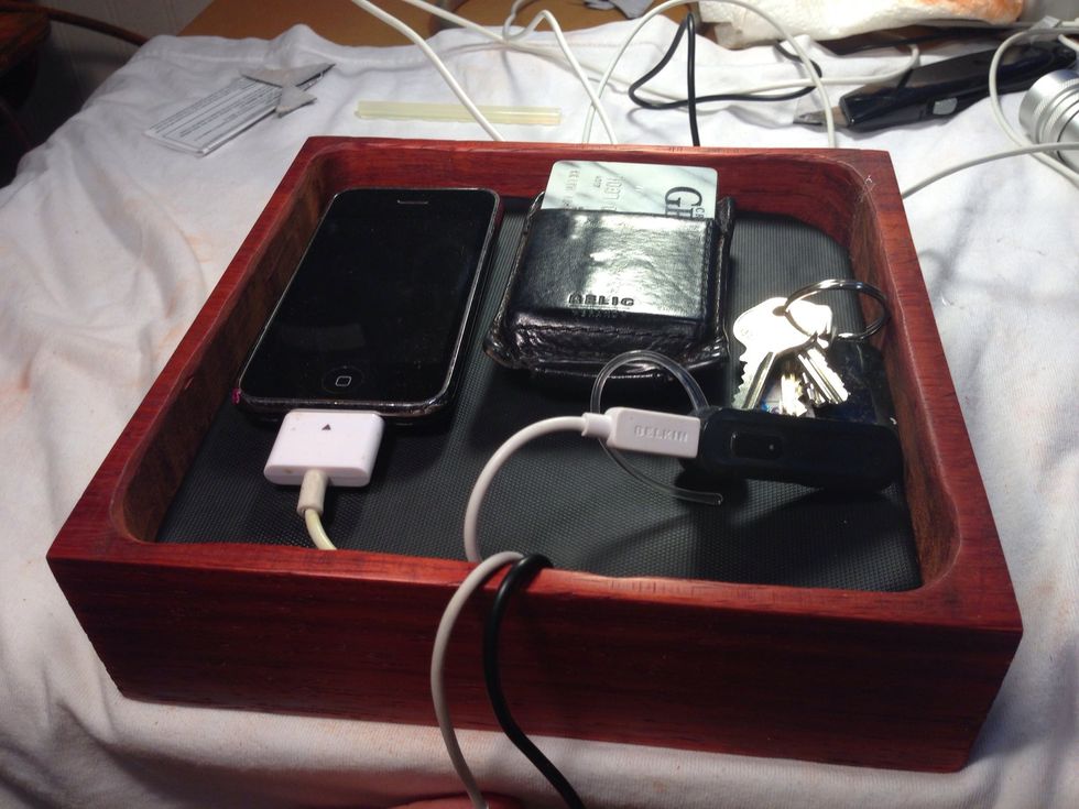 Looking better, holds iPhone charger, ear piece charger, iPad charger, and blue tooth keyboard charger.