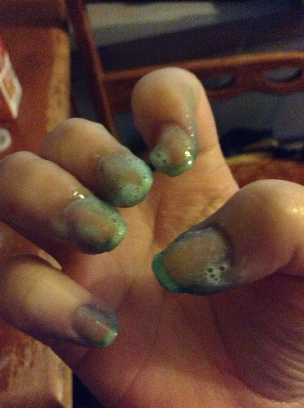 Looks kinda gross. Just dab some on your nails and scrub it in a little with a nail brush (or, I use an old toothbrush). Let it sit for about ten minutes, then wash your hands.