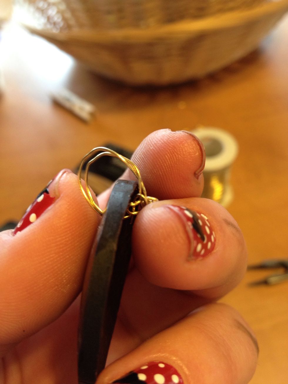 Loop it around twice, and twist/crimp the ends until you know it will stay put.