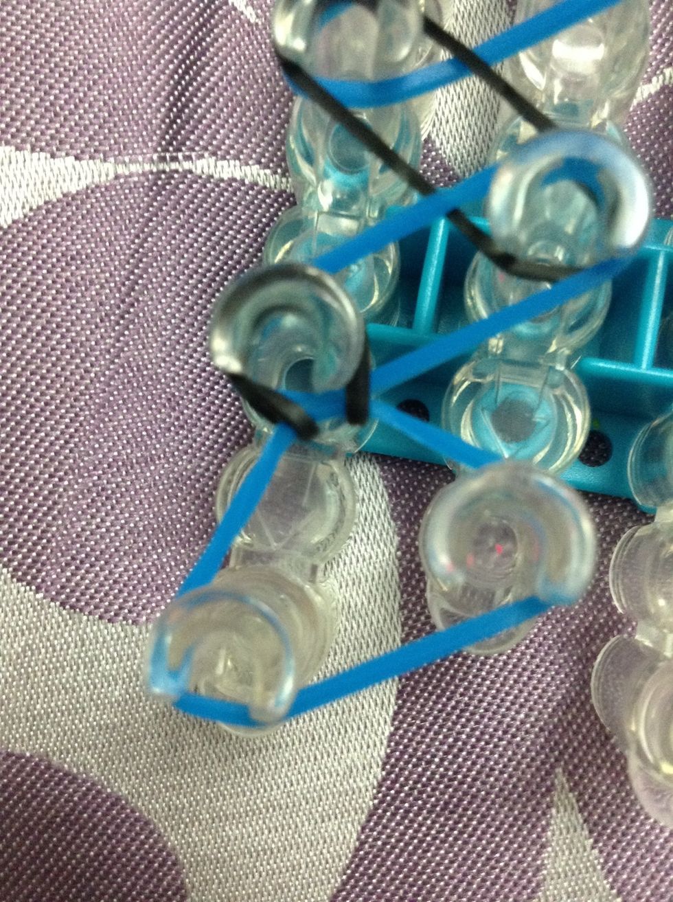 Loop it over top on to the Peg