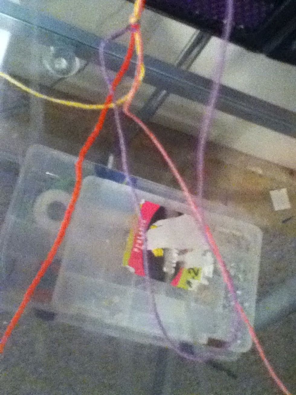 Loop it under, and pull it tight. Repeat.