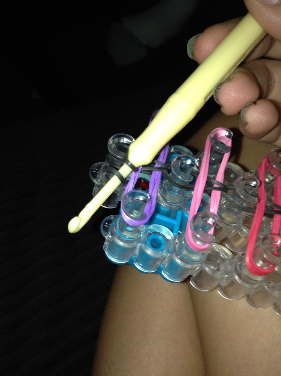 Loop the band onto the hook.