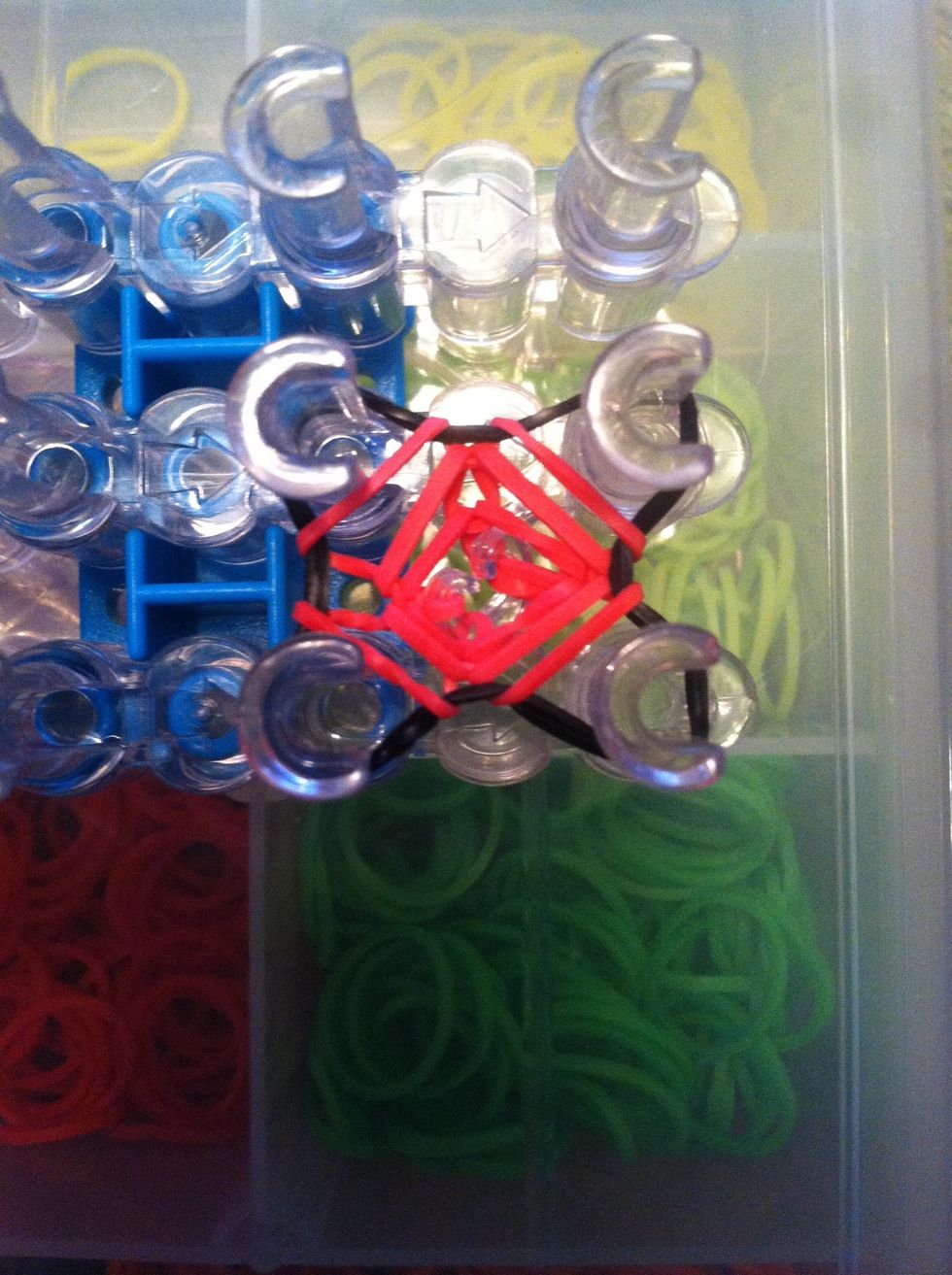 Loop the bottom band over the top bands