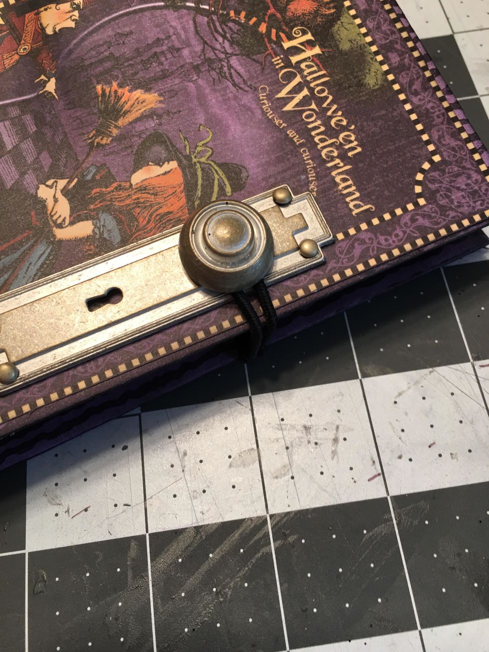 Loop the elastic over the door knob to keep the junk journal closed.