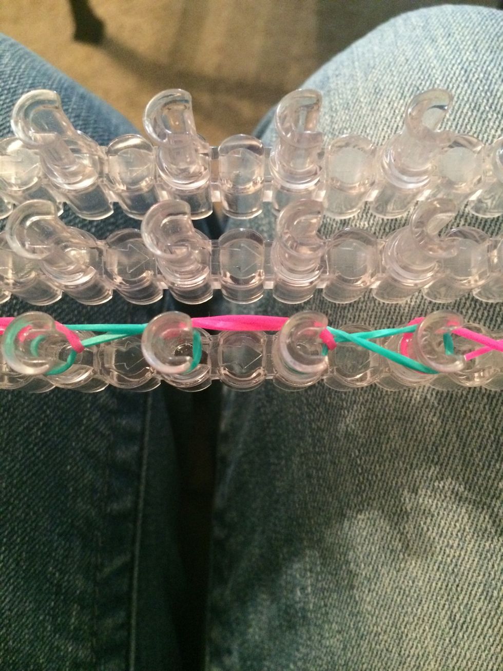 Loop the next pink rubber band