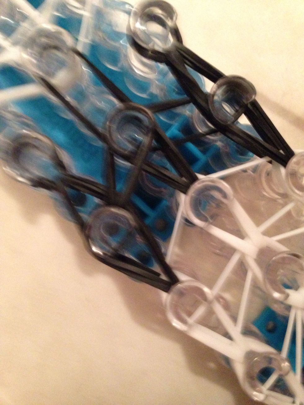 Loop them to the middle peg