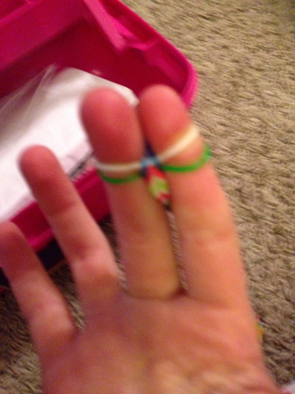 Loop up the bottom one like step 2(sorry about the picture it's a little blurry)