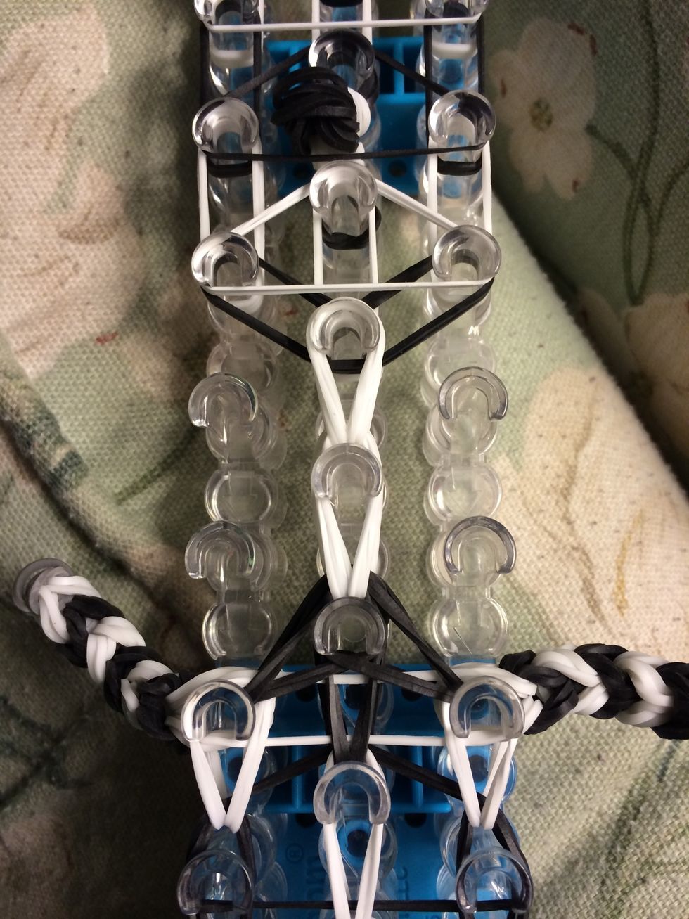 Loop up the neck. Be careful,since we have 4 bands in each set it is ok to loop 2 bands at a time so you don't break your hook.