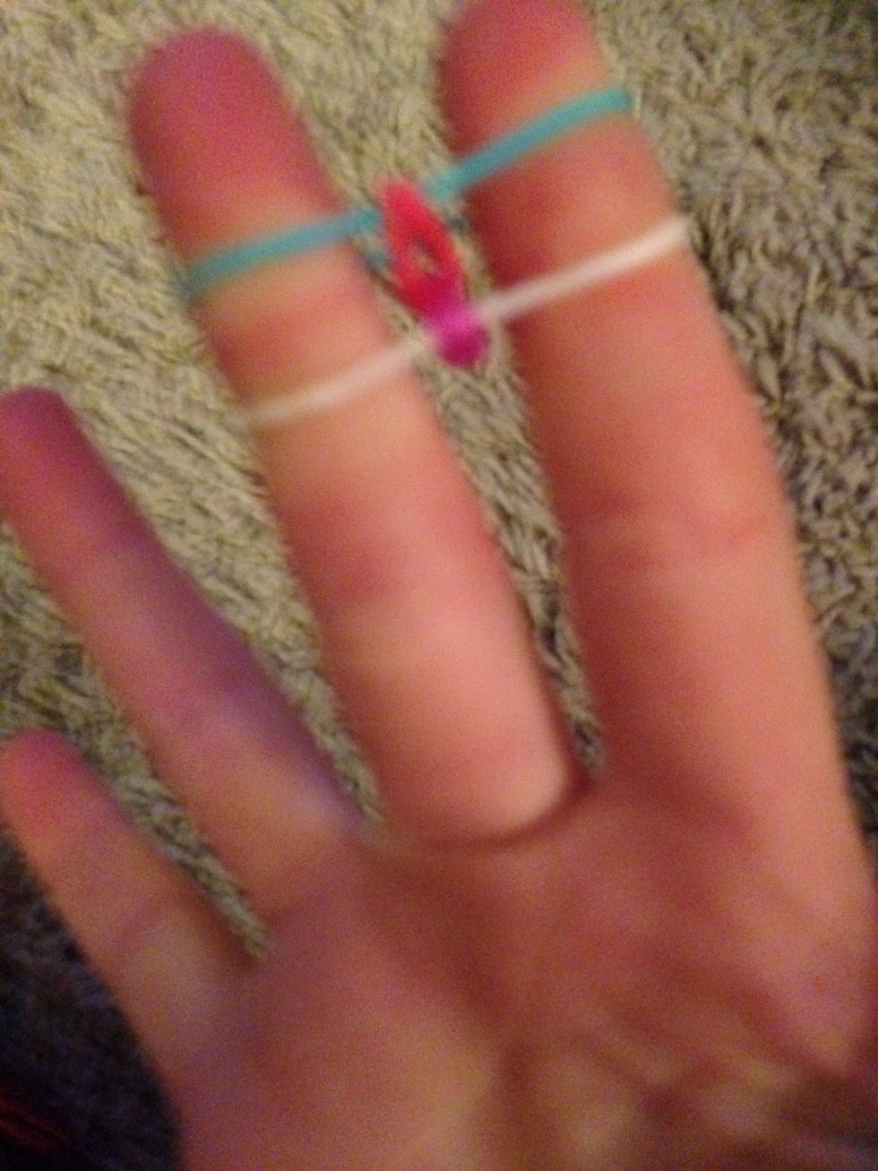 Loop up the next bottom one on both sides like on step 2