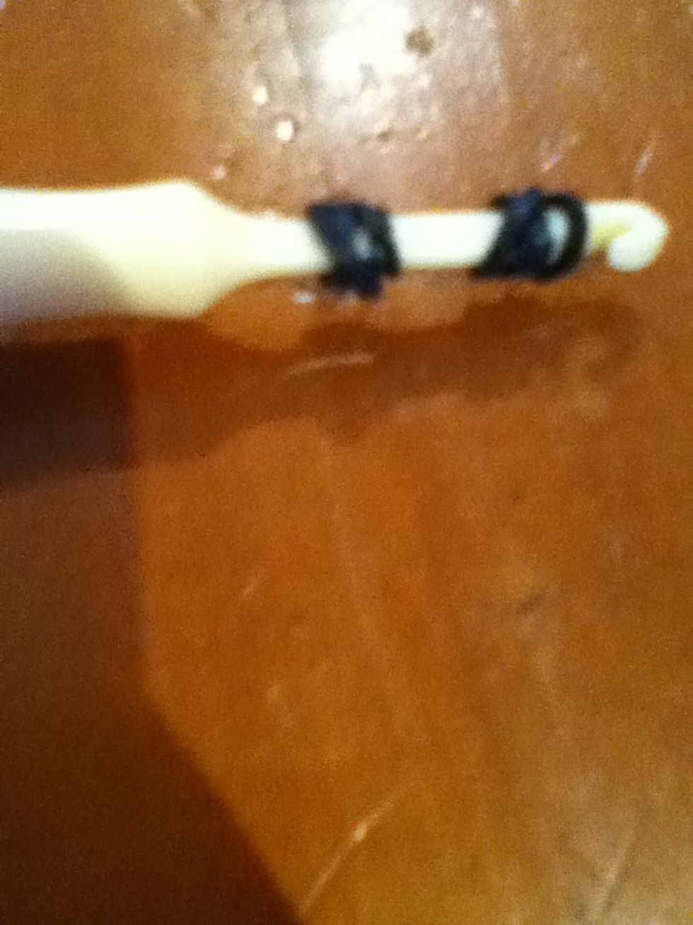 Loop your two black bands four times.