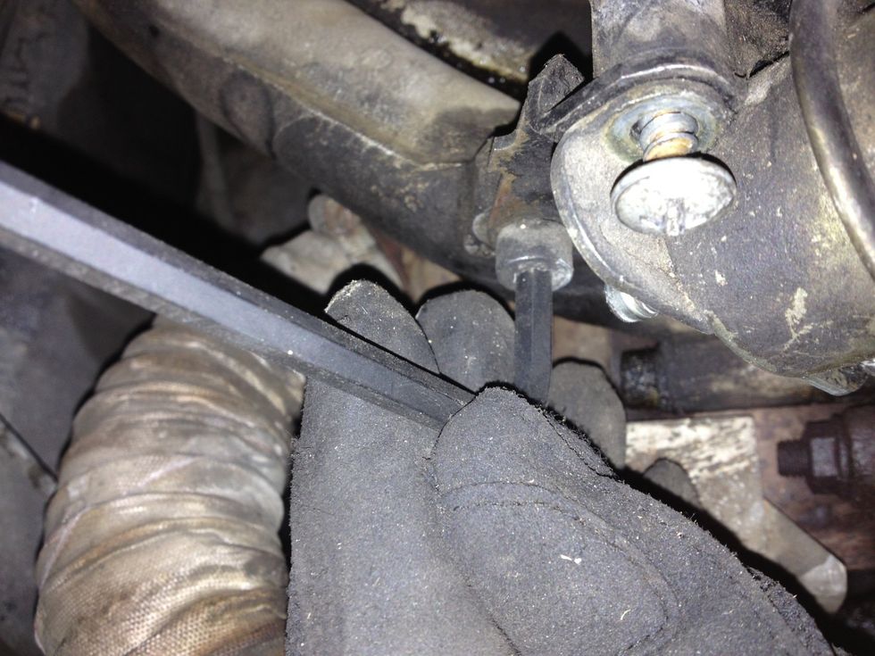 Loosen and remove Socket head mounting bolt. - 6mm hex wrench