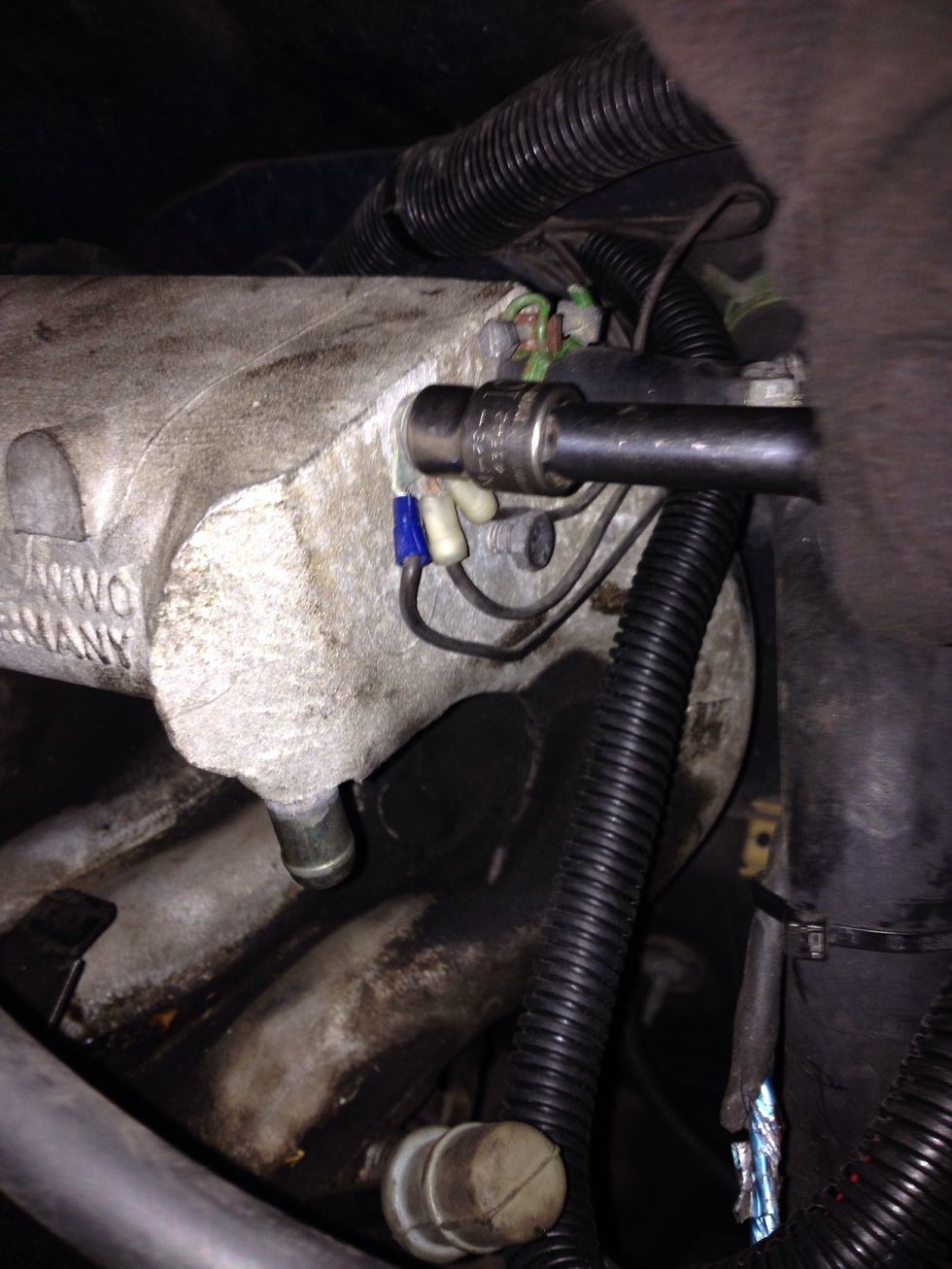 Loosen bolt grounding wires to intake manifold. - 10mm socket
