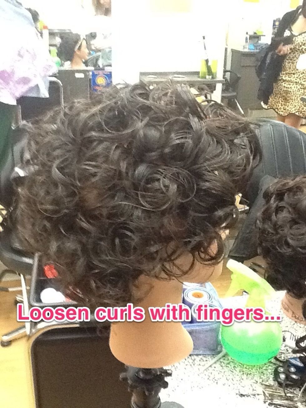 Loosen curls with fingers, as some clients will LOVE this look. This look will create lovely up-do's too!