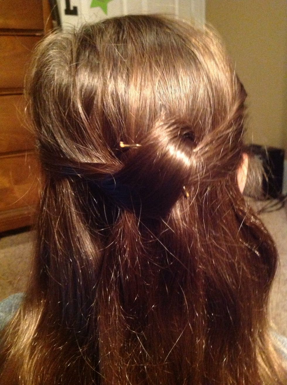 Loosen it up, and secure the hair with bobby pins.