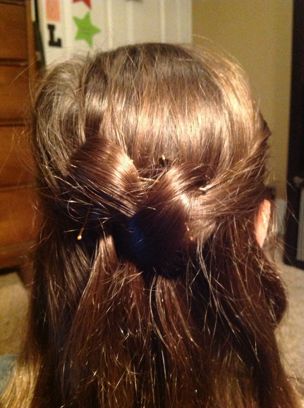 Loosen it up just like before, but this time, you'll want it a little higher than the previous piece. Secure with bobby pins.
