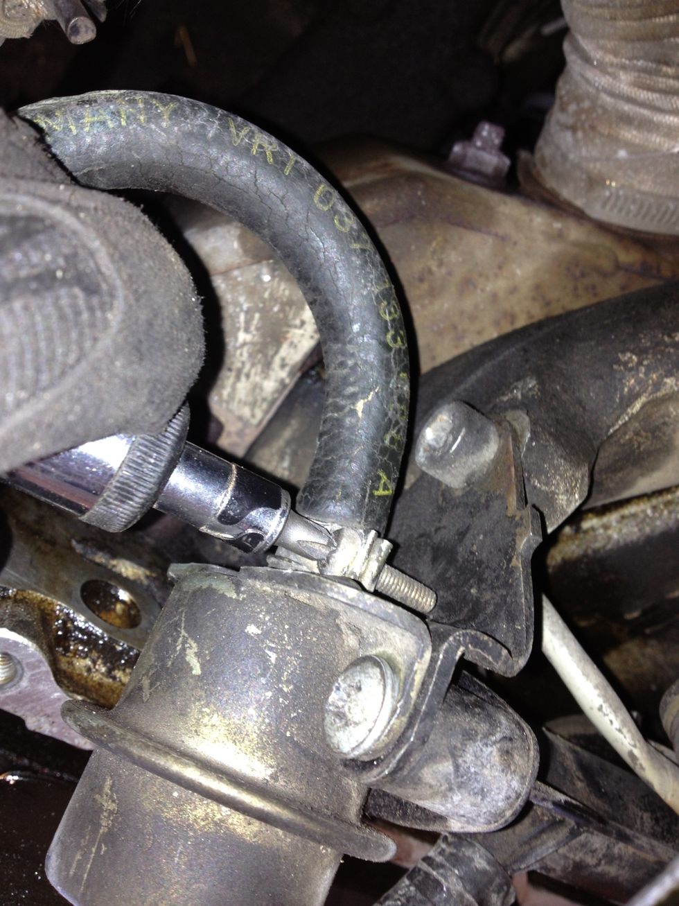 Loosen the clamp on the BLUE fuel return line
