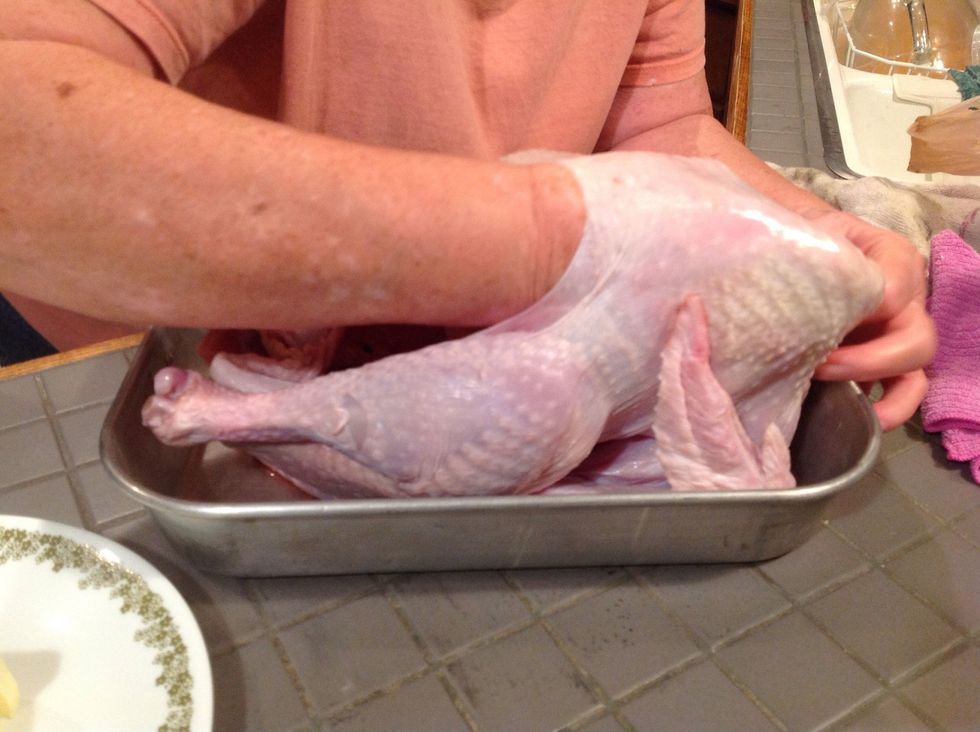 Loosen the skin around the turkey as much as you can.