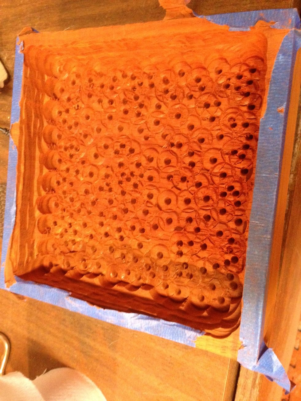 Lots of drills and used the router to get the rest of the wood cleaned out. It is starting to look like a square bowl. Use Blue tape to protect the edges.