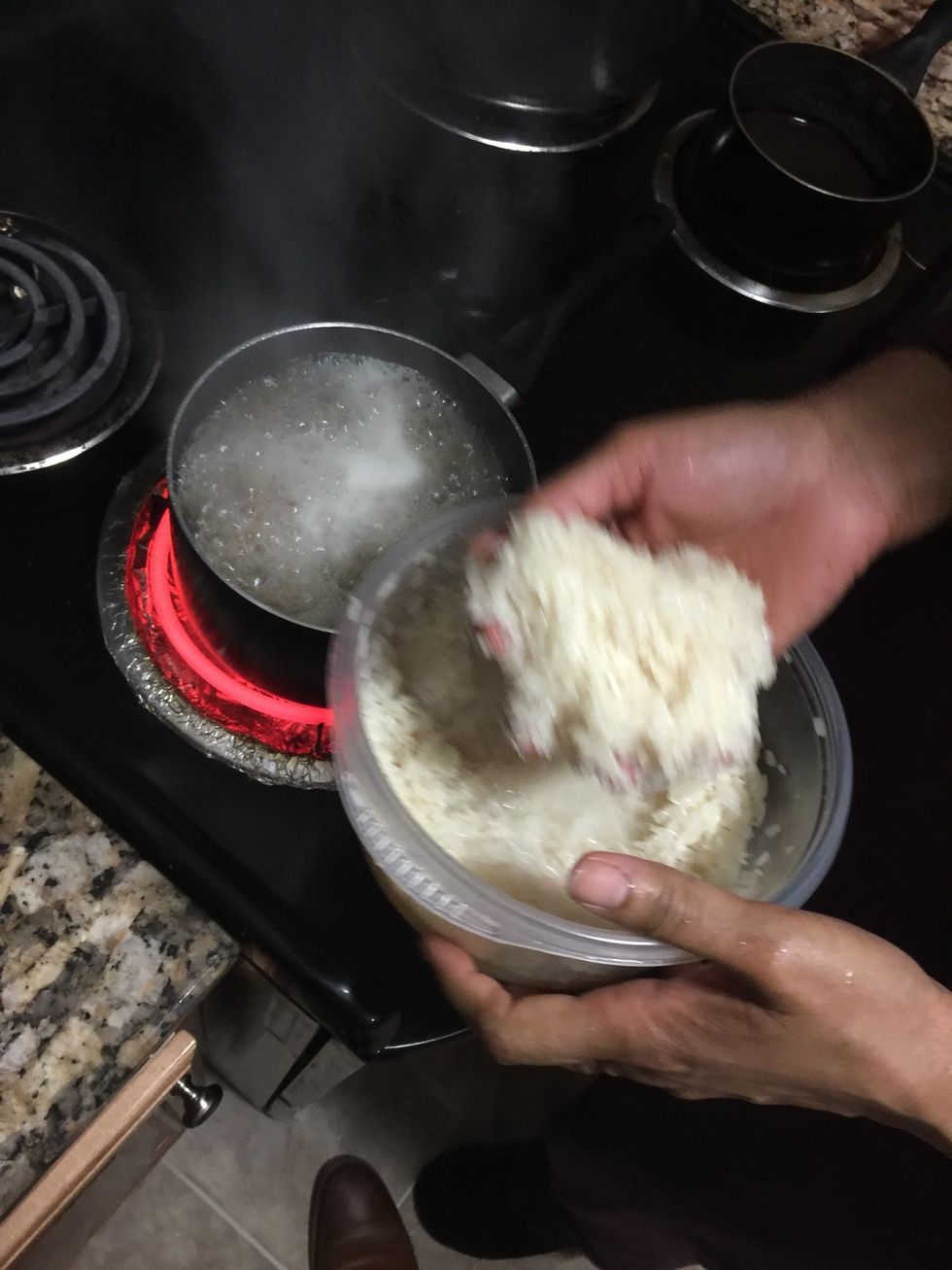 Lower heat to 6 \u2022 add rice