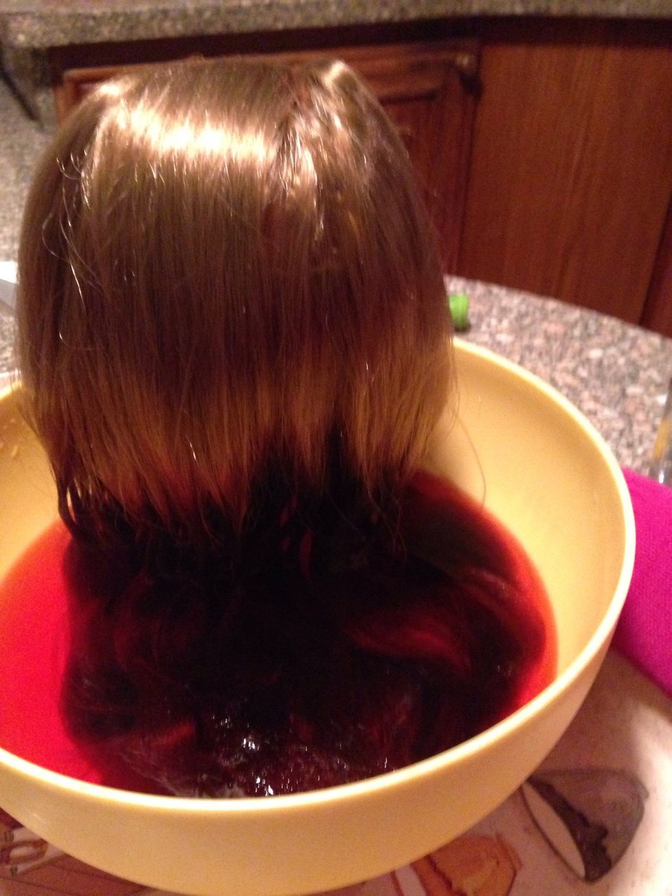 Lower more hair into the bowl
