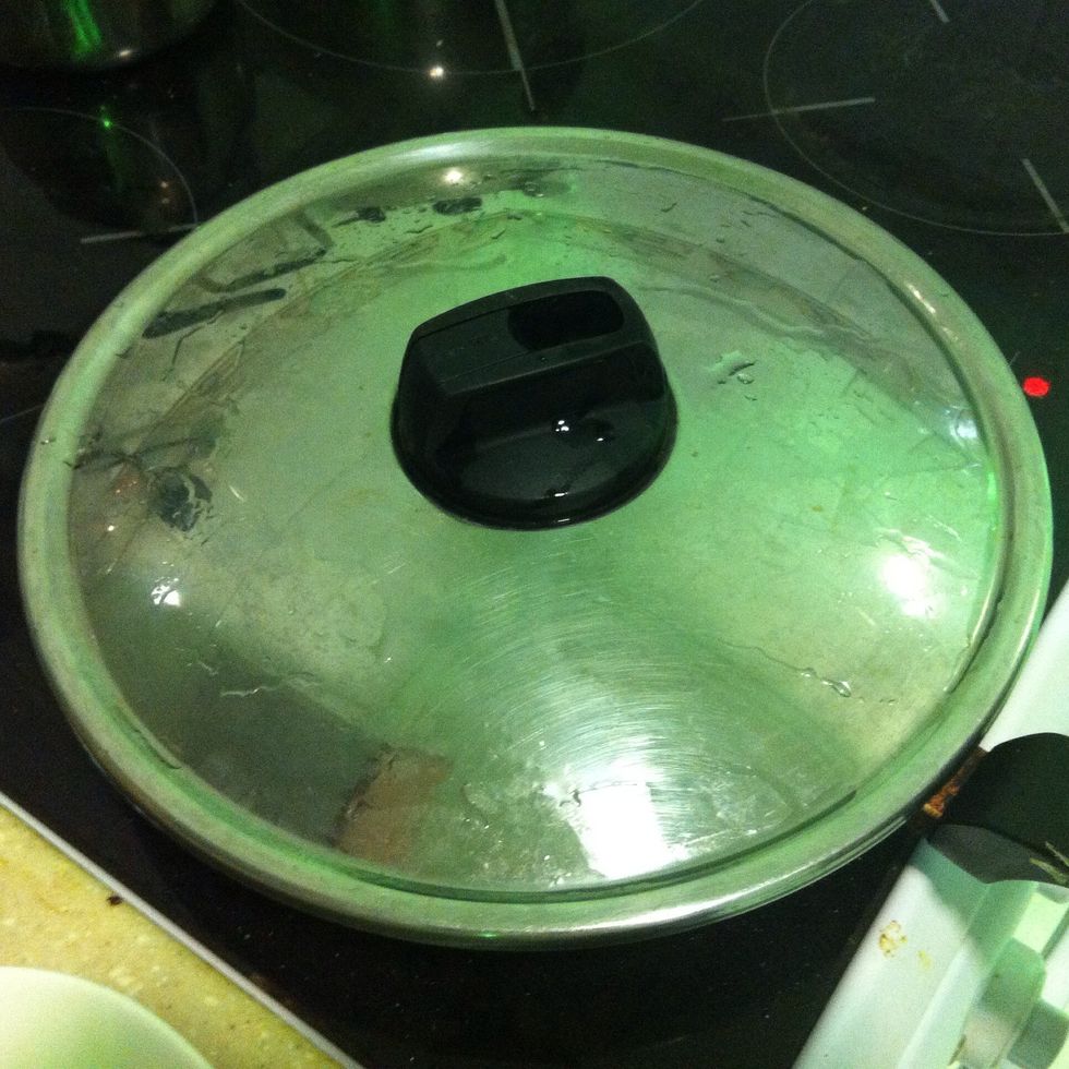 Lower the heat and cover the pan