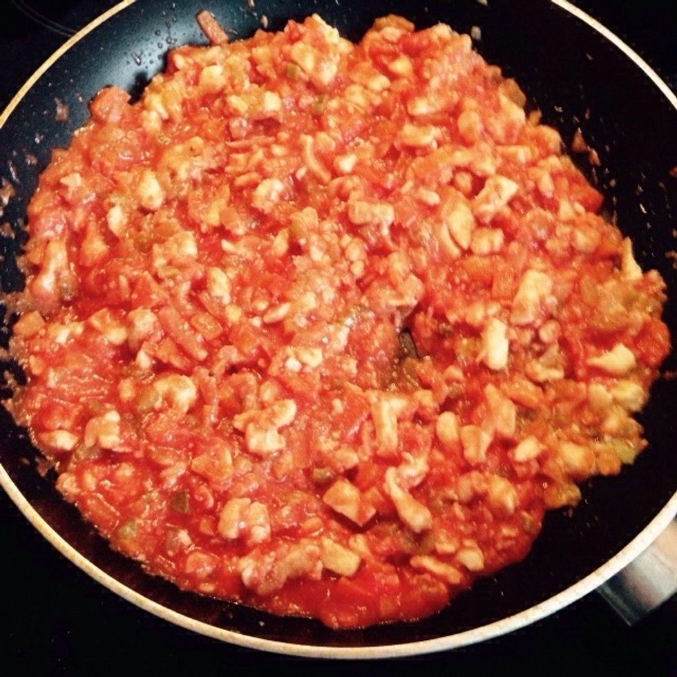 Lower the heat and cover with a lid. Add salt and pepper to taste. Let cook for 10-15 minutes