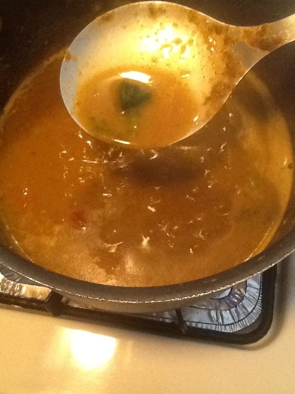 Lower the heat and let's wait for it to thicken up. DO NOT PLACE A POT OVER THE BEANS IT WILL NOT THICKEN! ;) I added some frozen cilantro that I had. Please put fresh in if you have some!!