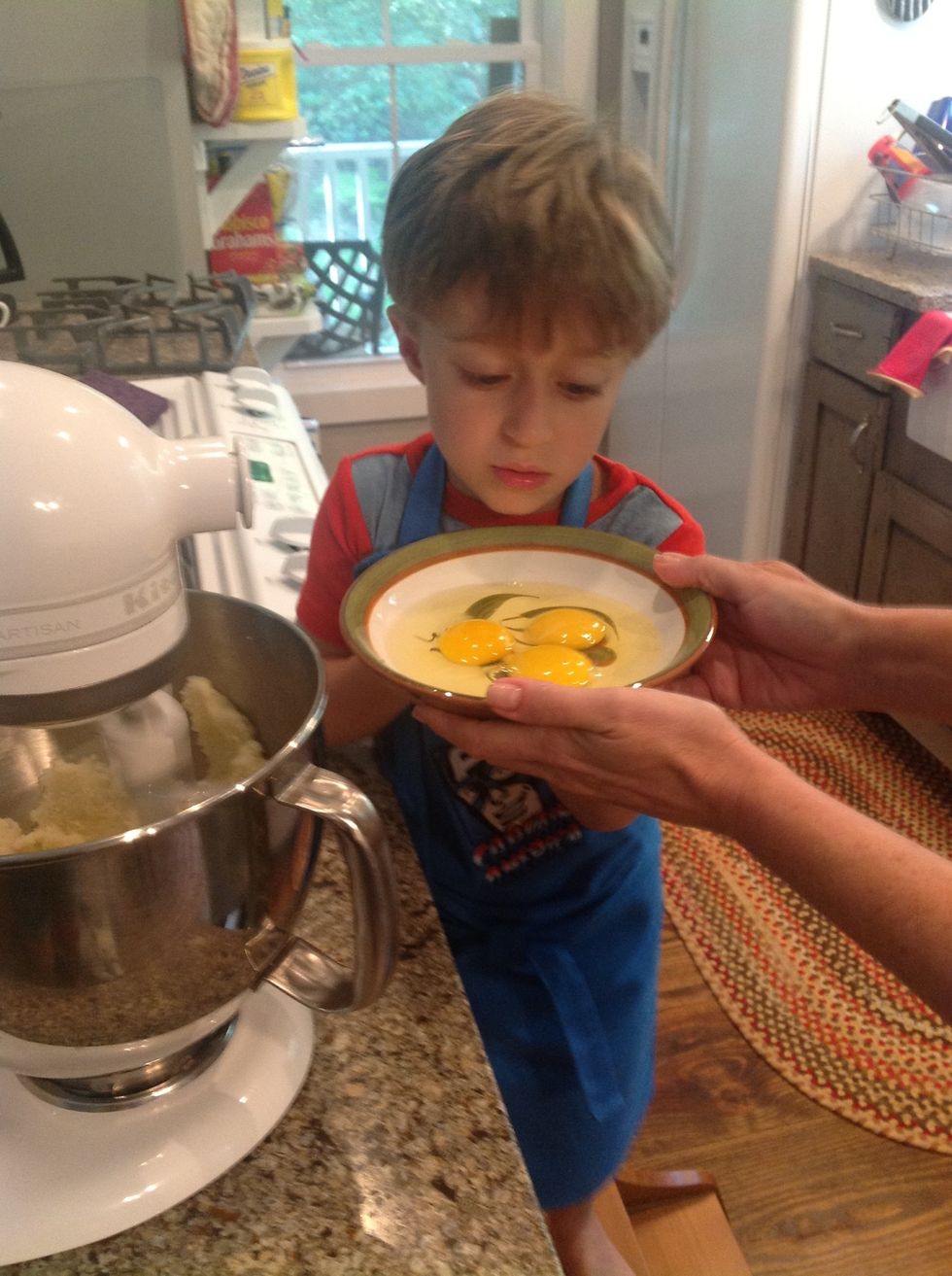 Lower to speed 4 and add 3 eggs.