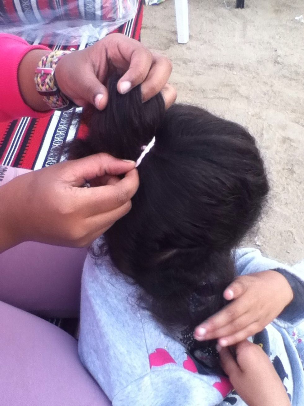 lsolate the other by a hair tie