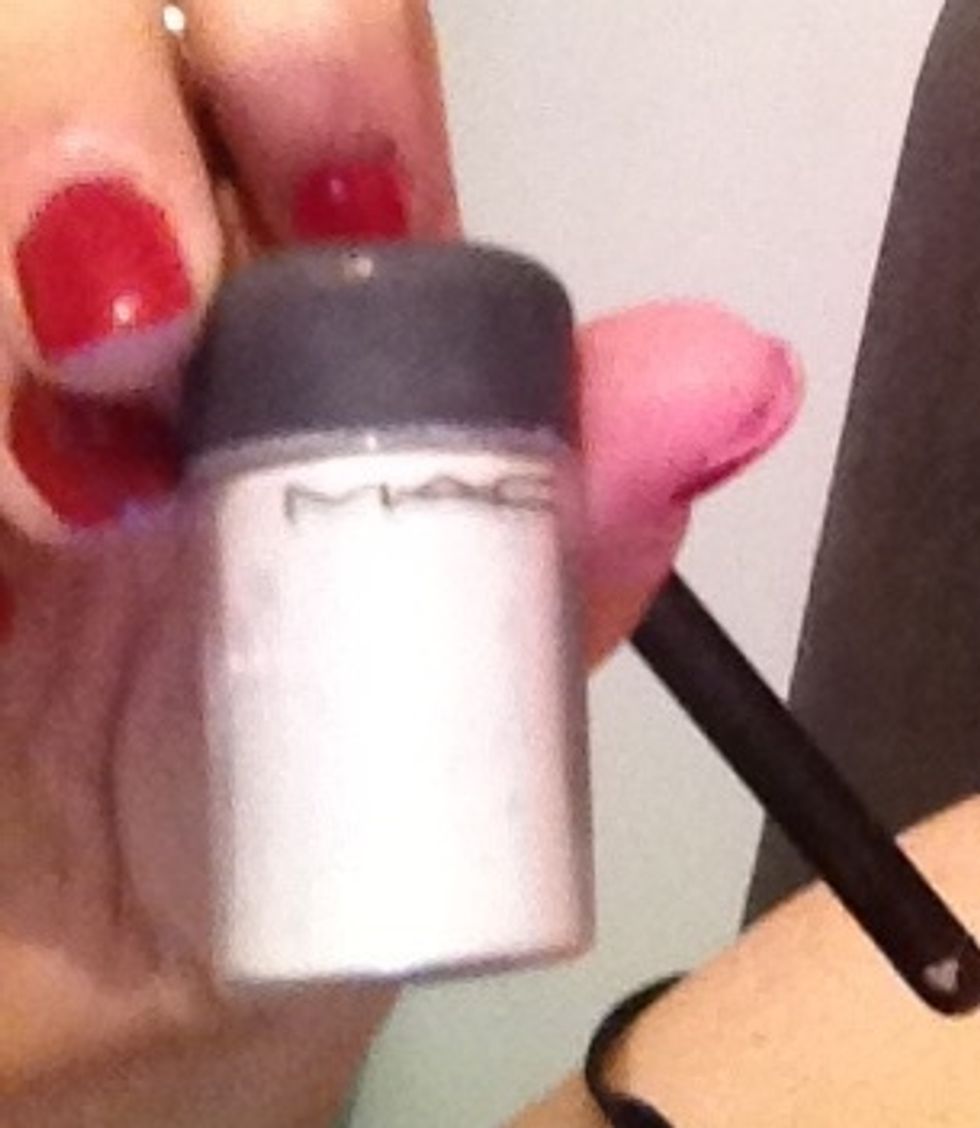 Mac vanilla pigment I love this product and use it everywhere on brow bone, tear duct, lips and cheek bones.