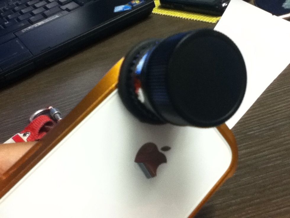 Macro lens with lens cap attached to cover lens mount fror dust and scrath