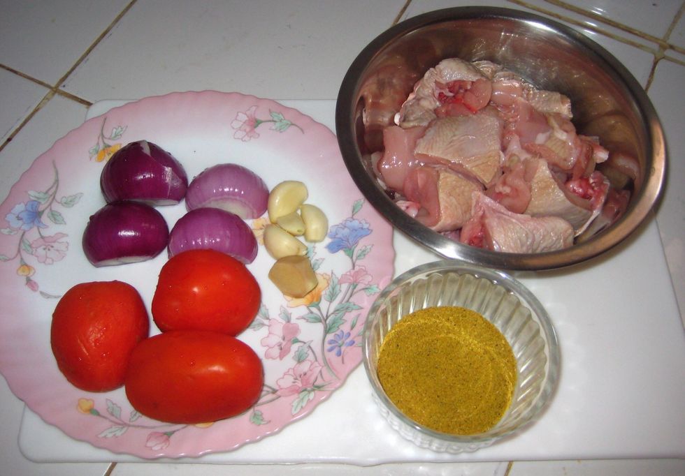Main ingredients. For the chicken, cut it into equal pieces so that it can cook evenly. For the curry powder, you may need to adjust the amount depending on how spicy you may want the food.