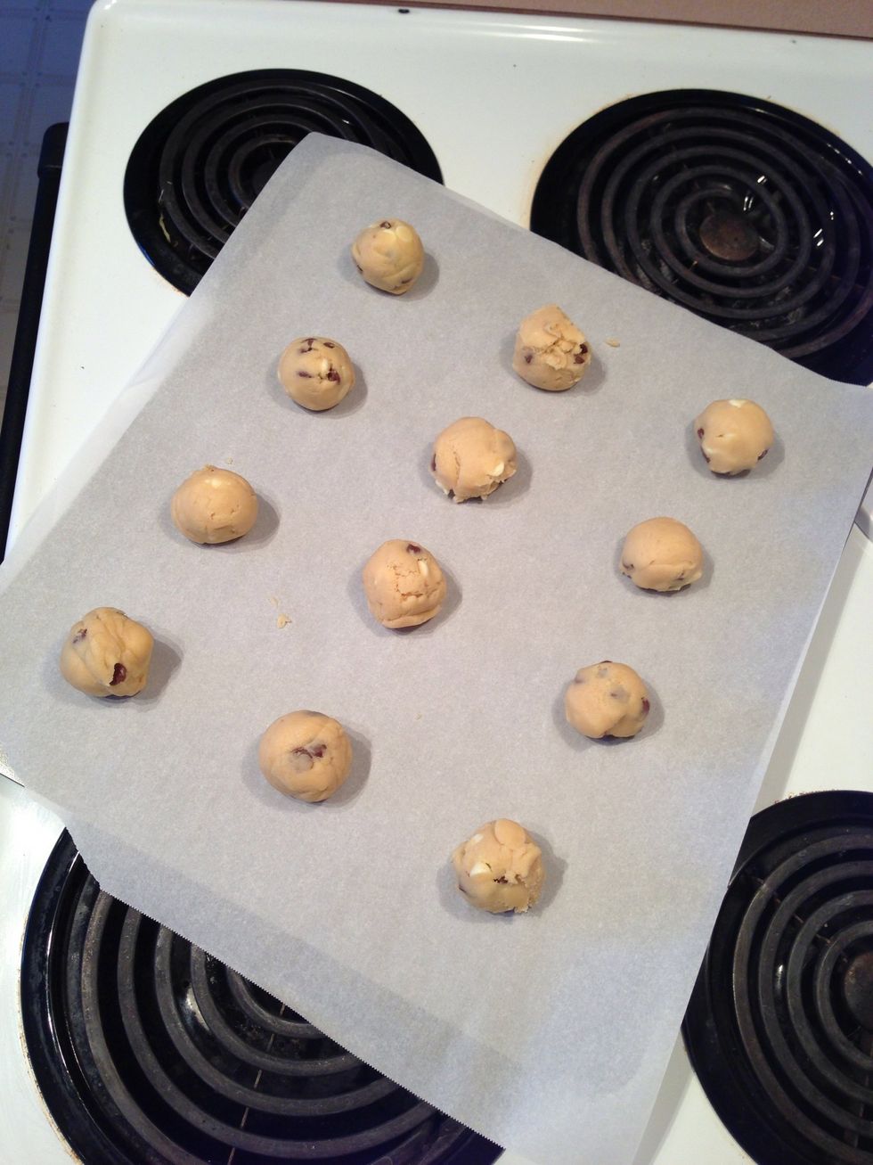Make 1" balls and drop them onto the cookie sheet in 3 rows of 4.  Bake for 12-14 minutes until lightly golden.