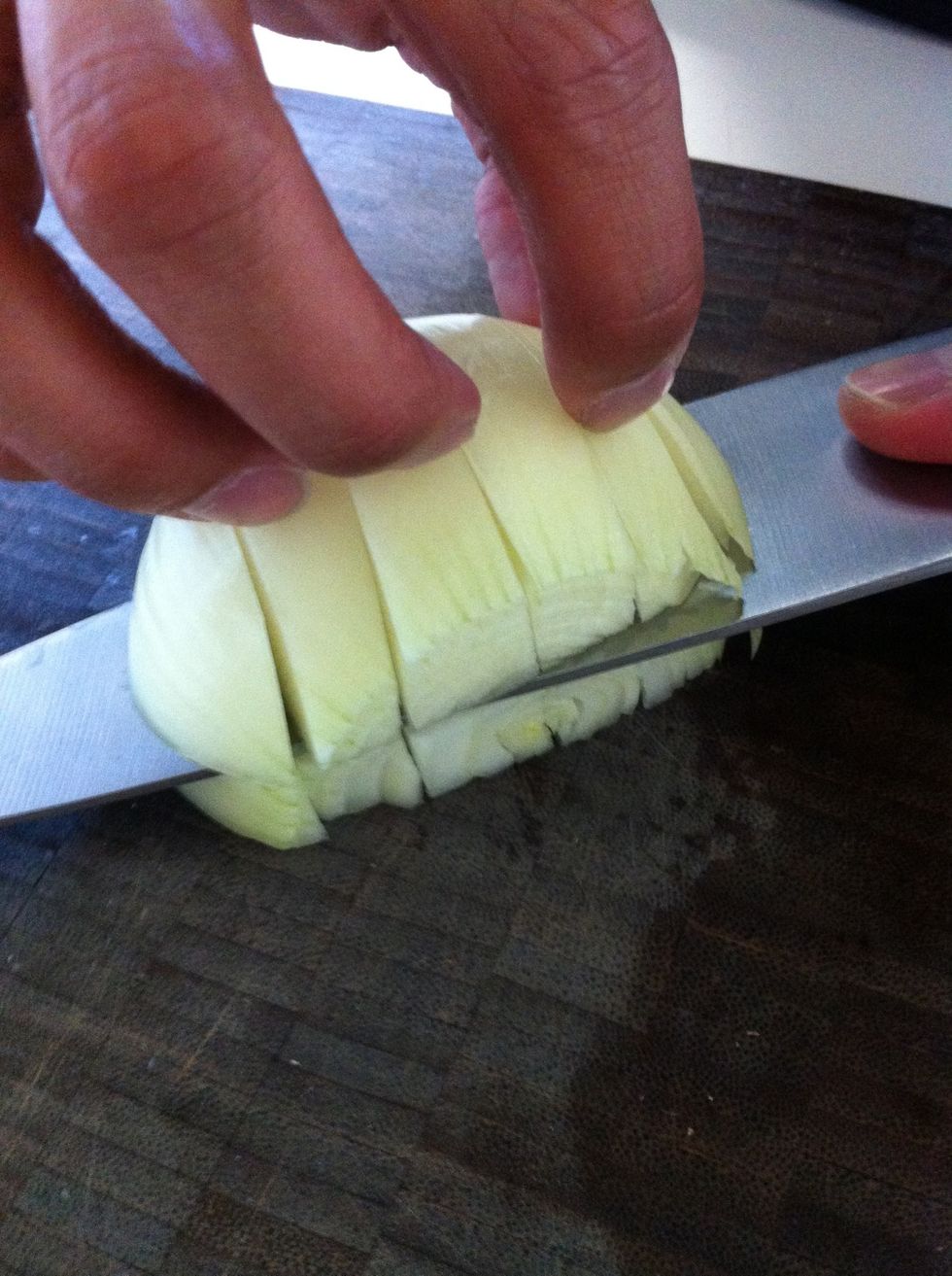 Make 1 horizontal cut in the onion. Remember to only go 3/4 the length!