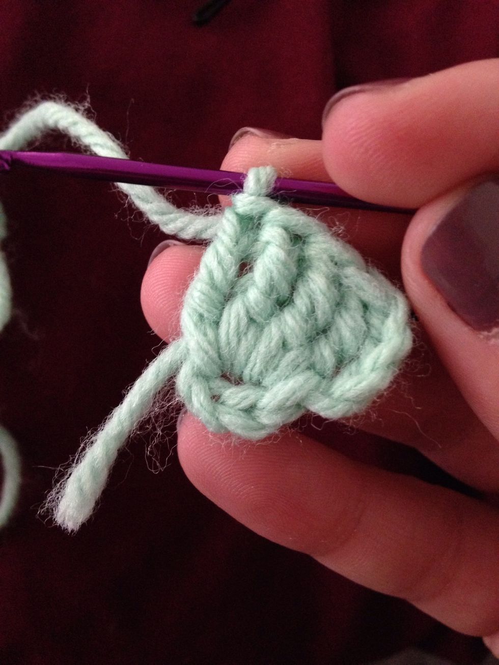 Make 4 treble crochets in center of circle.