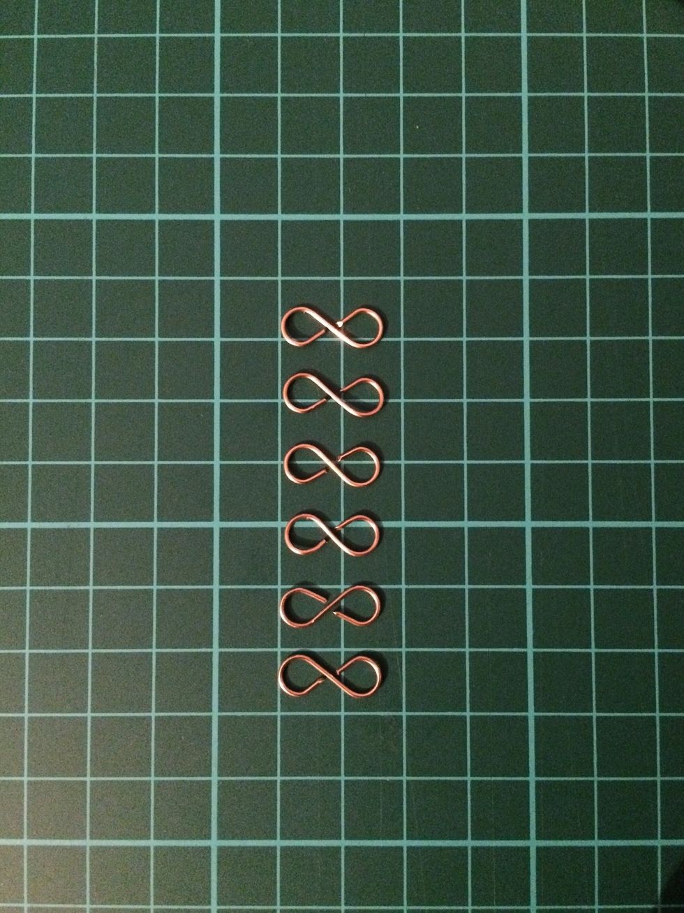 Make 6 of these. *Gently push down on each of them with your finger to make sure there are no gaps so the jump rings don't fall off.*