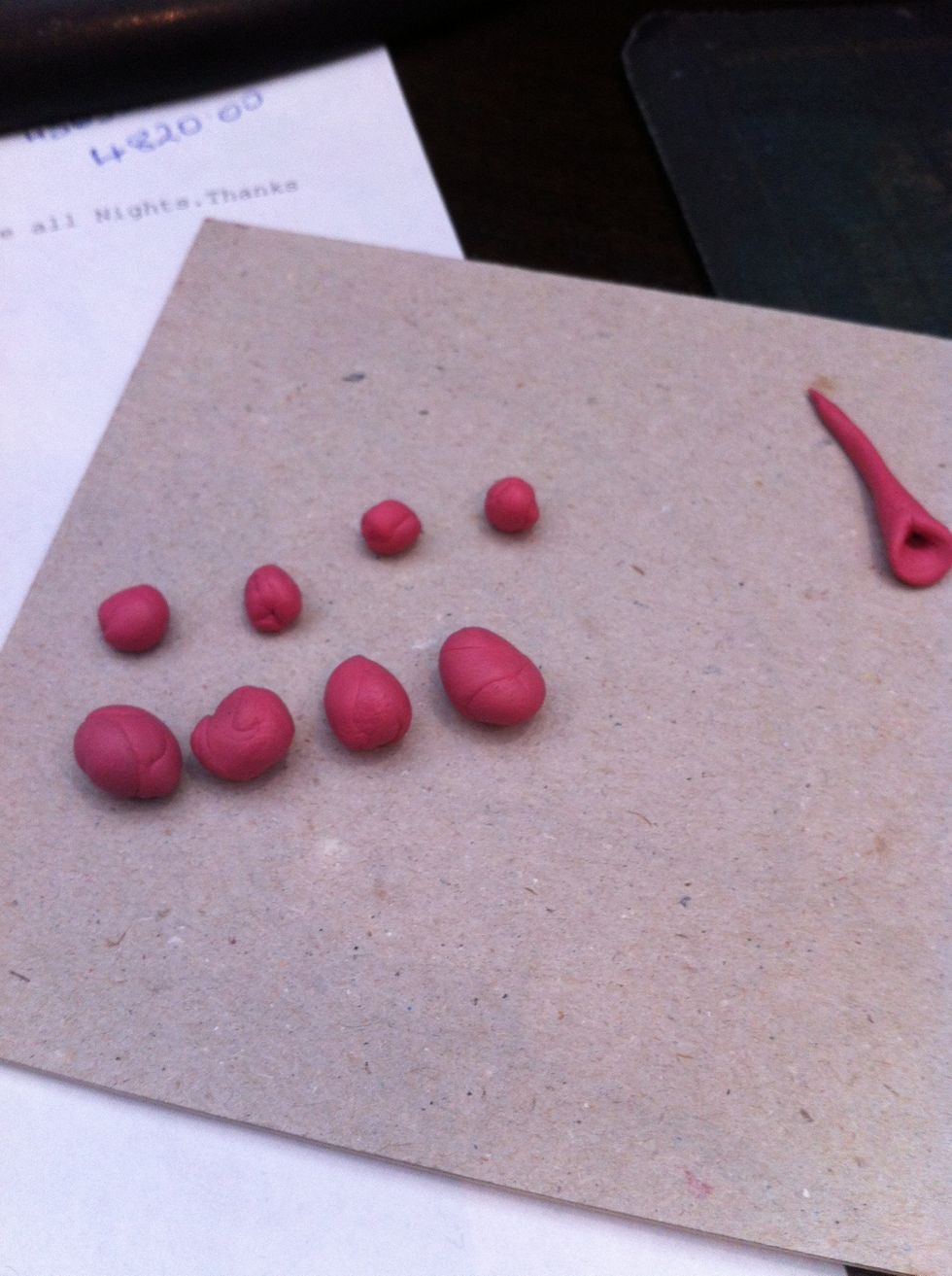 make 8 balls out of the tack; 4 small 4 large