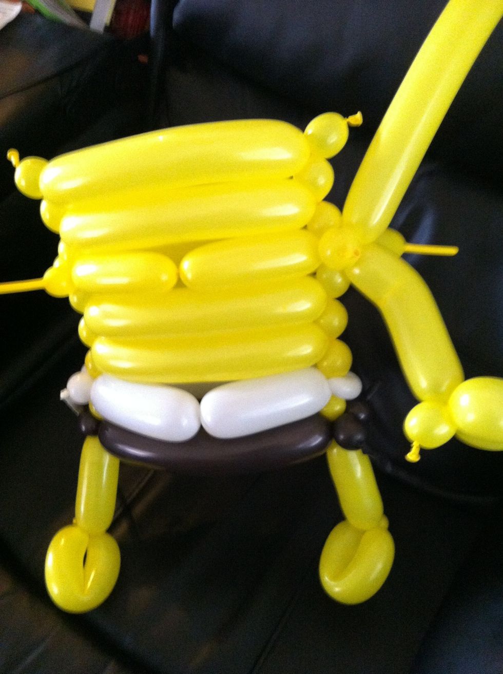 Make a 4-5" bubble to be the arm and twist it into extra bubbles in center of body