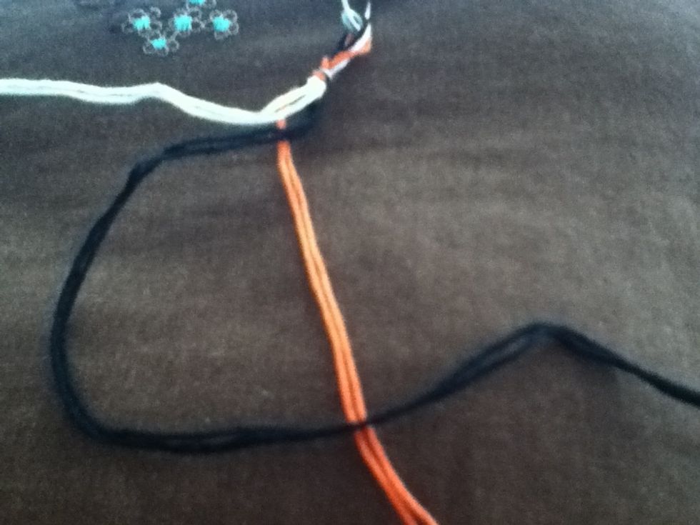 Make a "4" with the right thread.