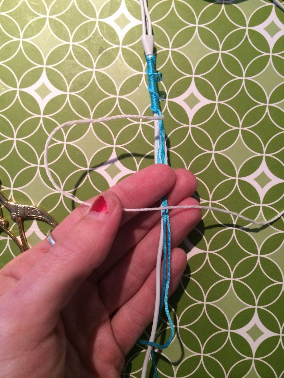 Make a 4 with your next color. And keep going. In this one I am using glow-in-the-dark string as my friend requested.