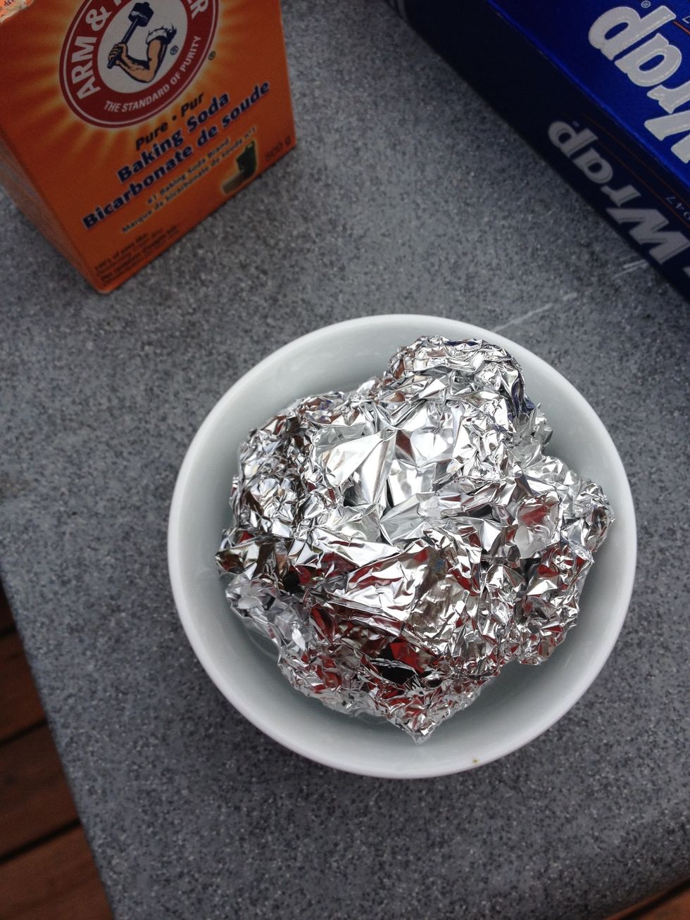 Make a ball out of the foil and dip it in the water