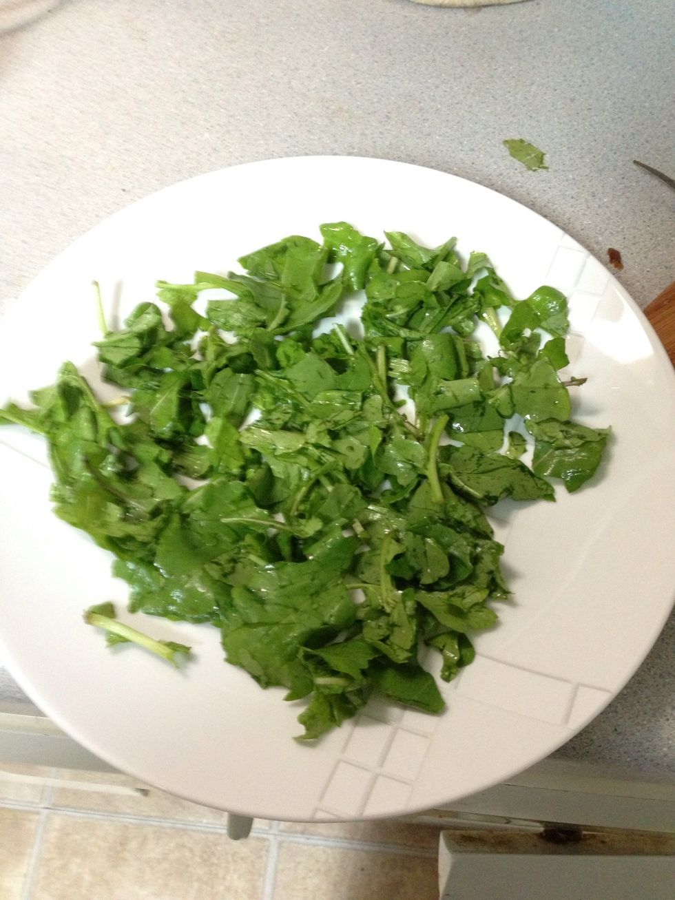 Make a bed of washed arugula