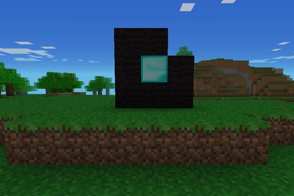 Make a black square with no top right corner with a diamond block in the middle