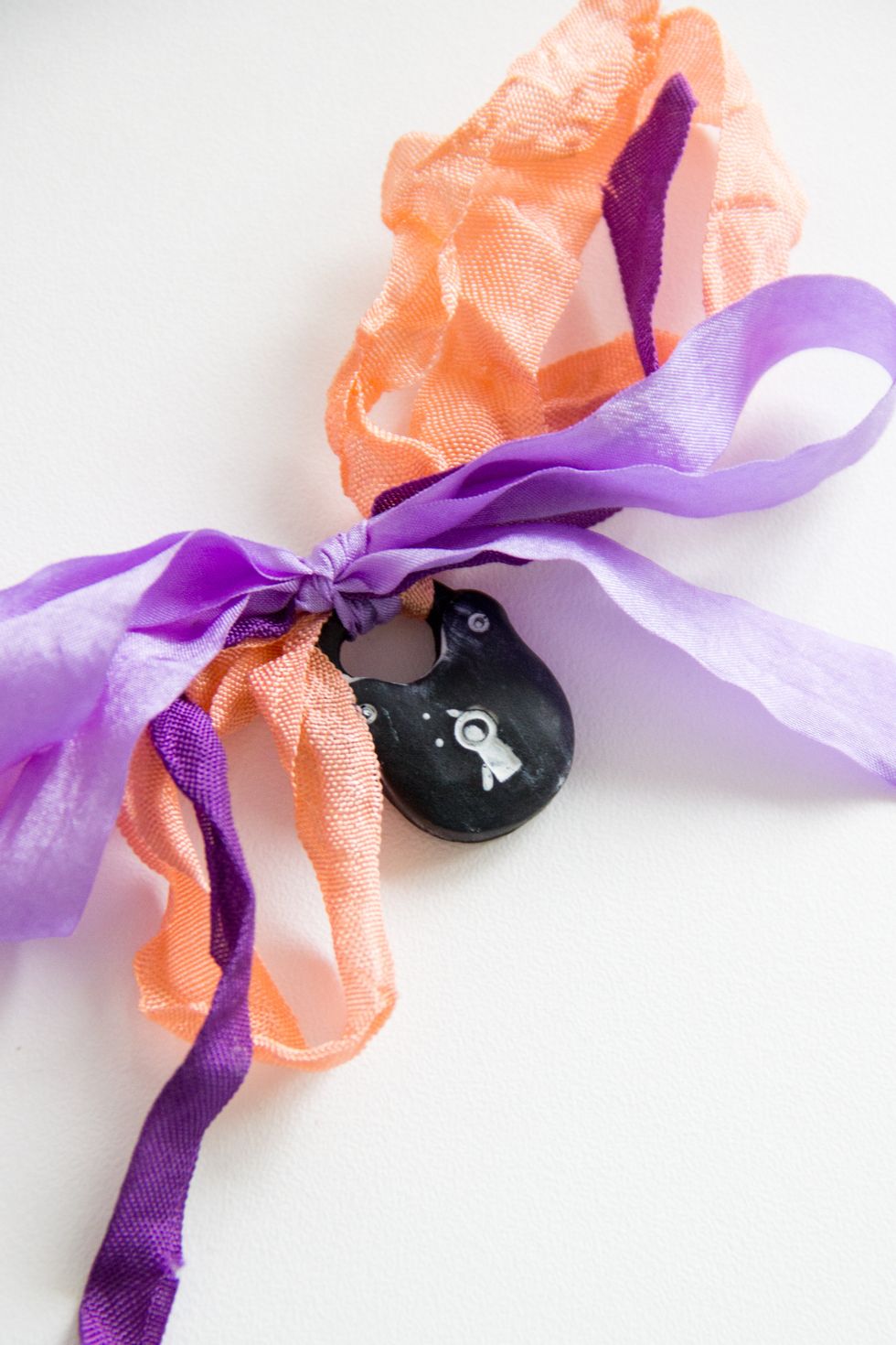 Make a bow and attach some resin embellishment.