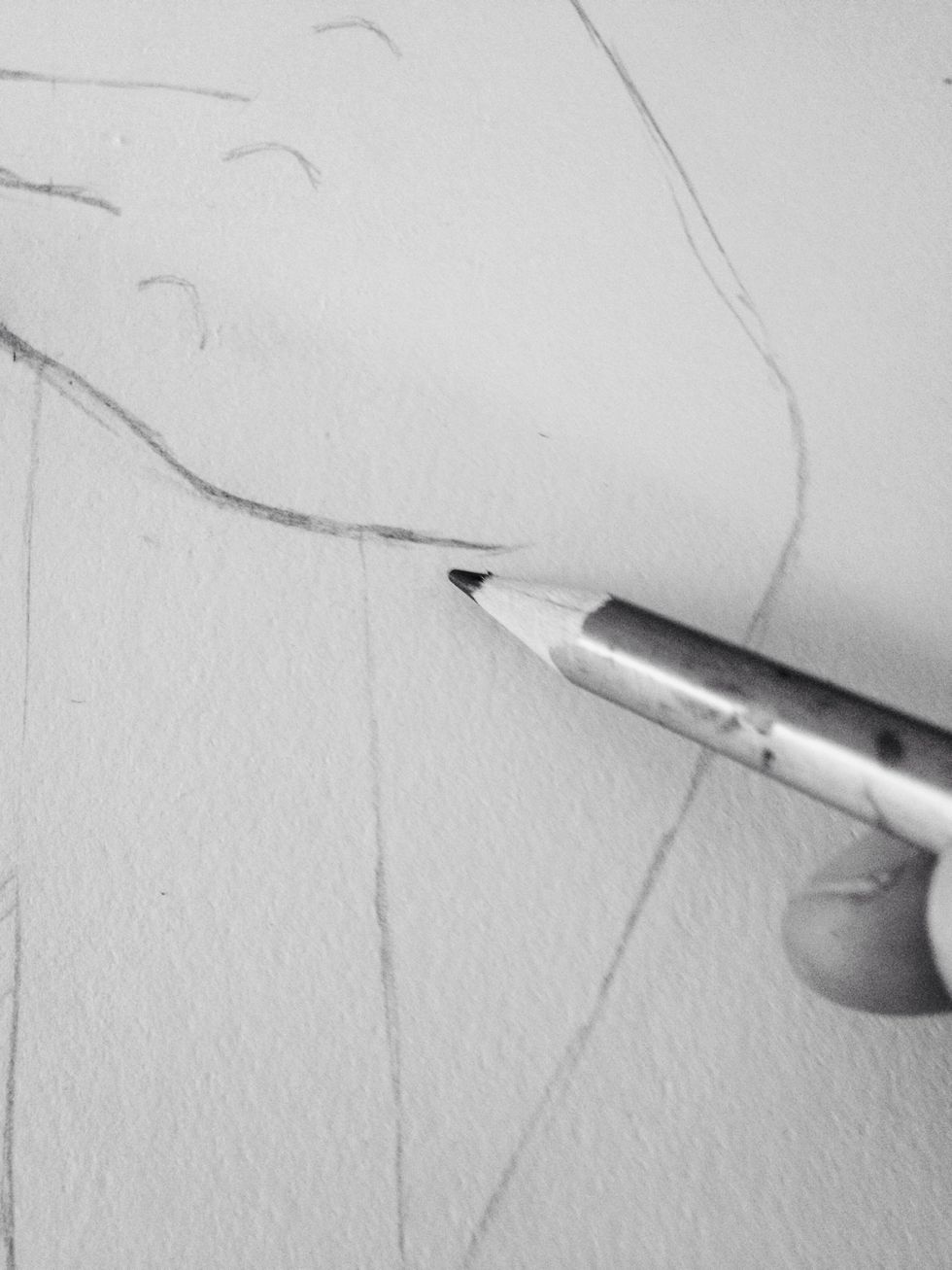 Make a but of shading where the arm bends to hold the staff.