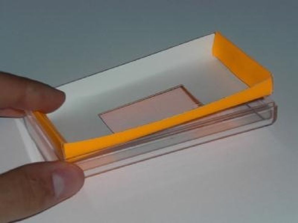 Make a cardboard covering or something like that, it just has to look good.